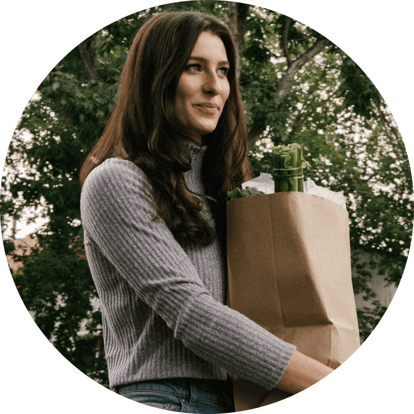 Person holding bag with groceries