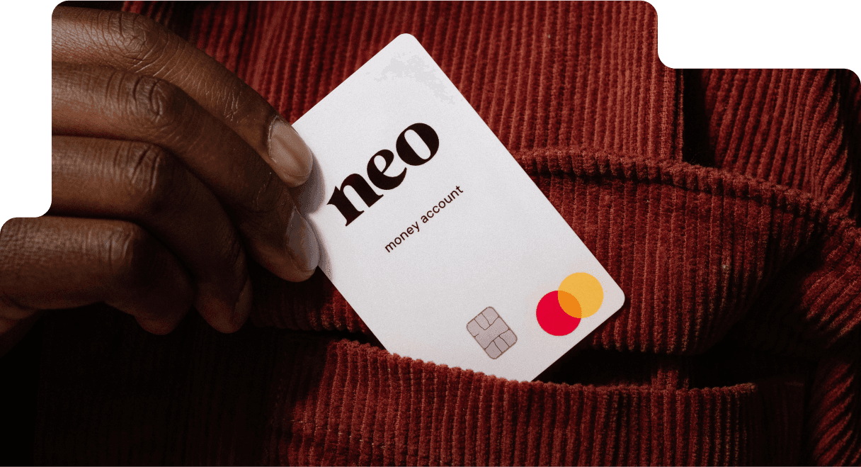 Hand holding a Neo Financial card